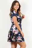 REBELLA SPRING ROMANCE, CURVY, PLUS SIZE, FLORAL VELVET WRAP DRESS, IN NAVY BLUE WITH PINK FLOWERS AND GREEN LEAVES- CLOSE UP SIDE VIEW