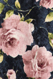 REBELLA SPRING ROMANCE, CURVY, PLUS SIZE, FLORAL VELVET WRAP DRESS, IN NAVY BLUE WITH PINK FLOWERS AND GREEN LEAVES- CLOSE UP VIEW ON VELVET PRINT